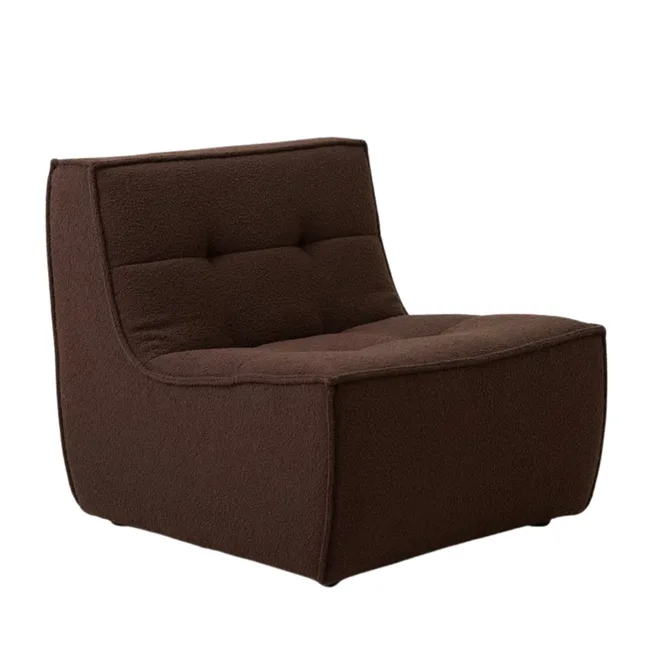 Chocolate brown modular armchair with no arms and tufted back