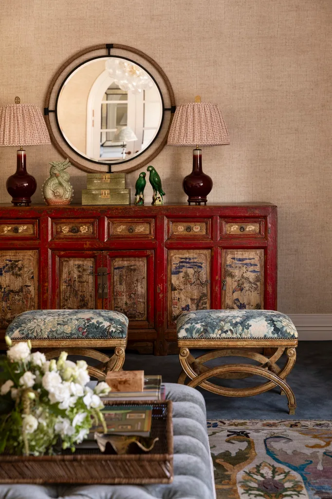 Melbourne Cape Cod-style home with a room that includes their red Chinese dresser and lamps by Melissa Balzan