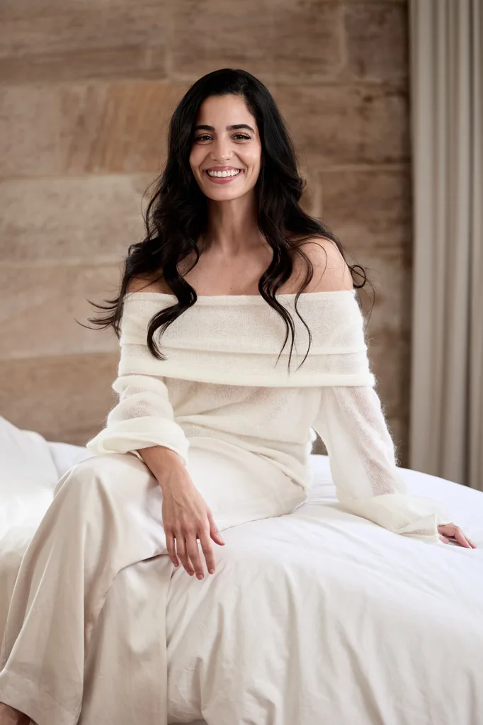 Diandra Politano sitting on treatment bed