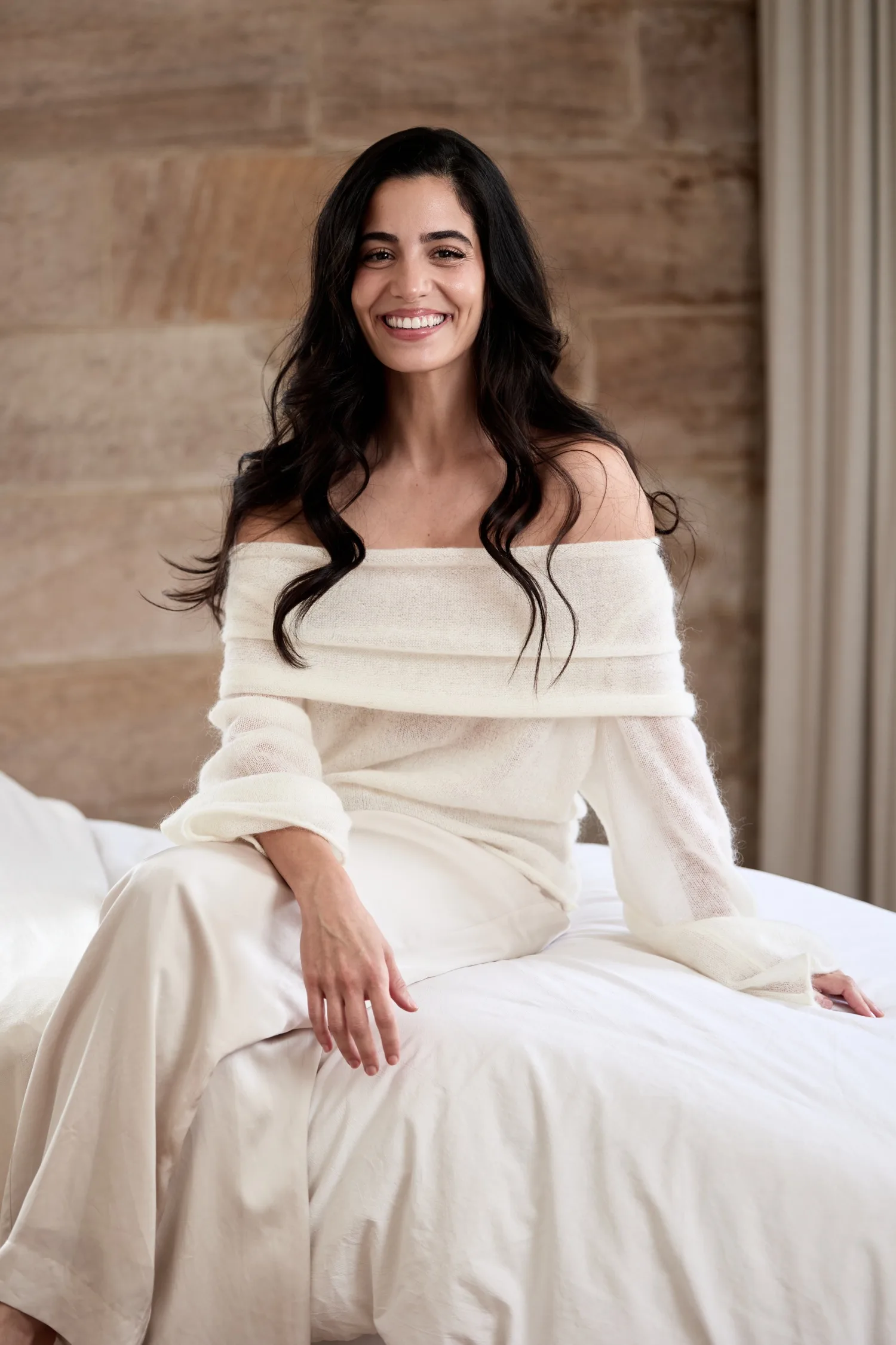 Diandra Politano sitting on treatment bed