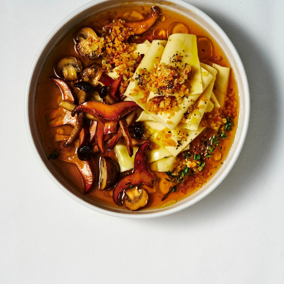 Parmesan and porcini broth pasta
