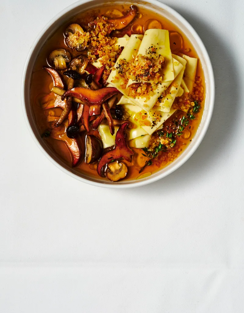 Parmesan and porcini broth pasta