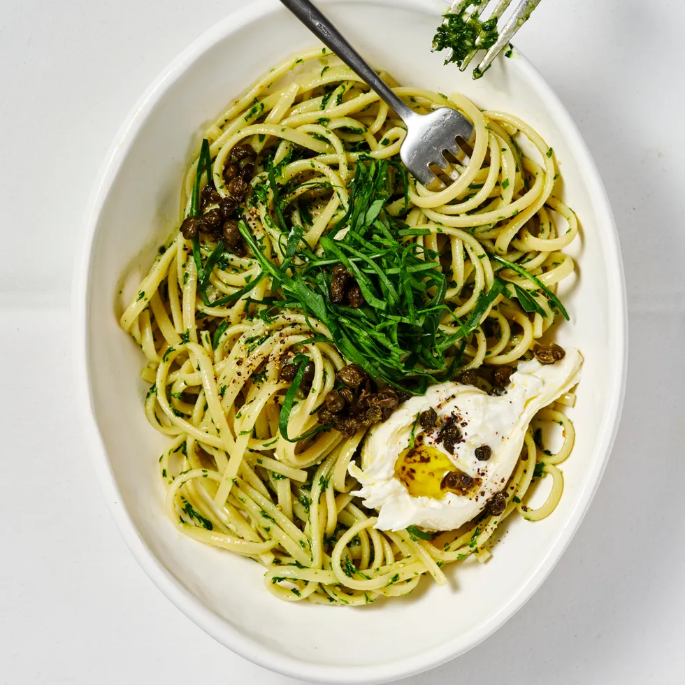 Parsley and pine nut pesto pasta with burrata and rocket