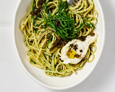 Parsley and pine nut pesto pasta with burrata and rocket