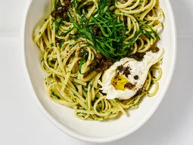 Parsley and pine nut pesto pasta with burrata and rocket
