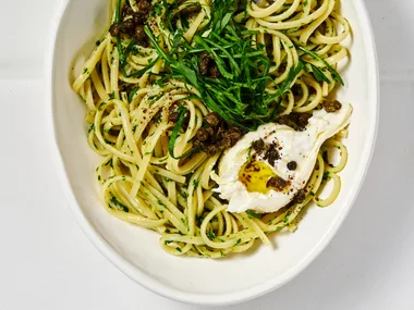 Parsley and pine nut pesto pasta with burrata and rocket