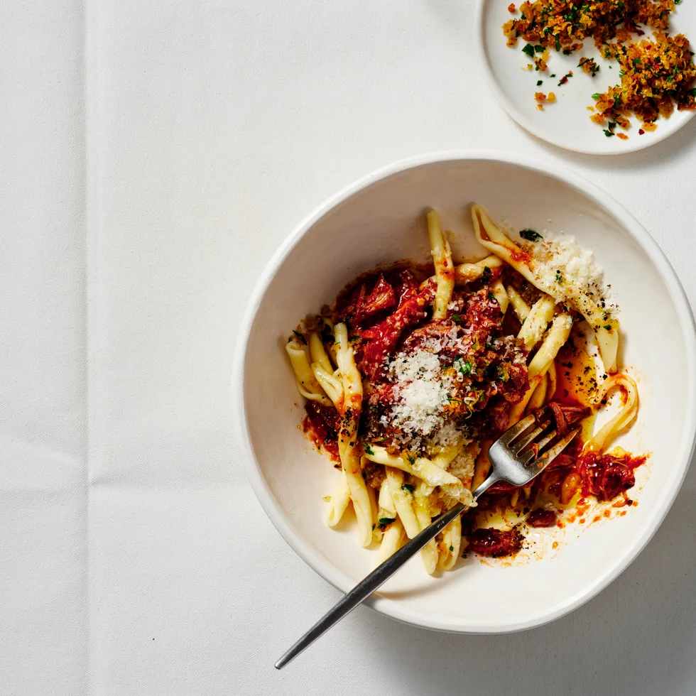 Slow-cooked lamb ragu with mint and anchovy pangratto