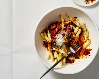 Slow-cooked lamb ragu with mint and anchovy pangratto
