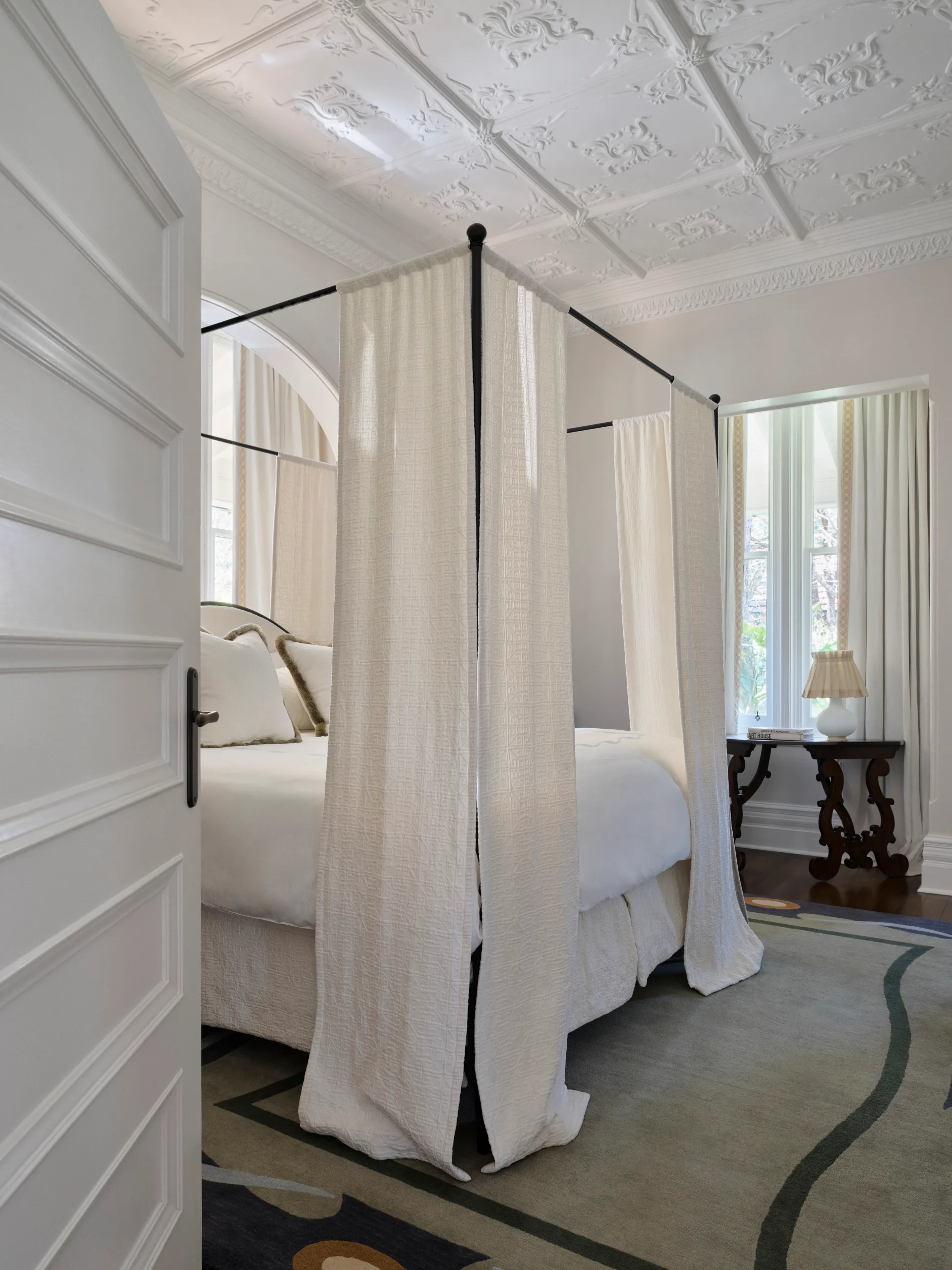 four-poster bed lends romance to a main bedroom interior designer Tamsin Johnson