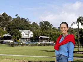 Jesinta Franklin inset with her original home in background