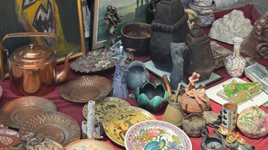 vintage plates vases and objects in a market