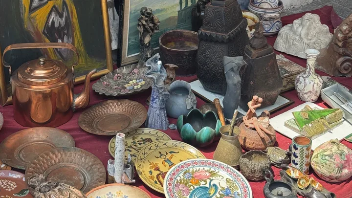 vintage plates vases and objects in a market