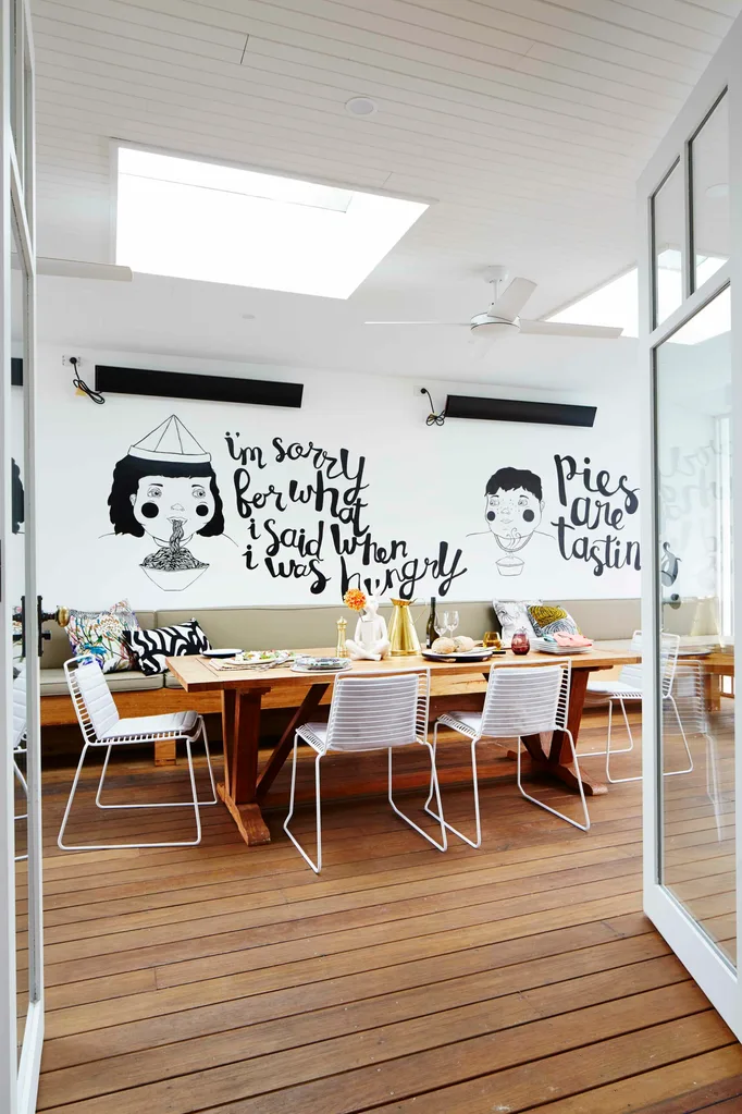 Personalised mural on the wall of the outdoor area
