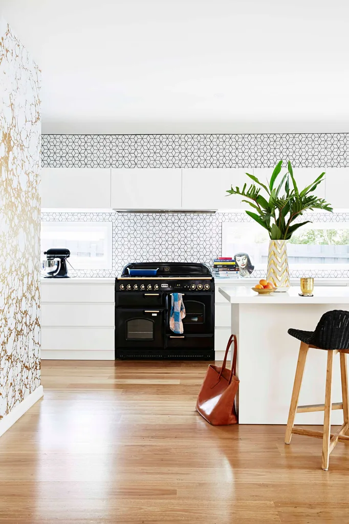 Kitchen with gold marble wallpaper