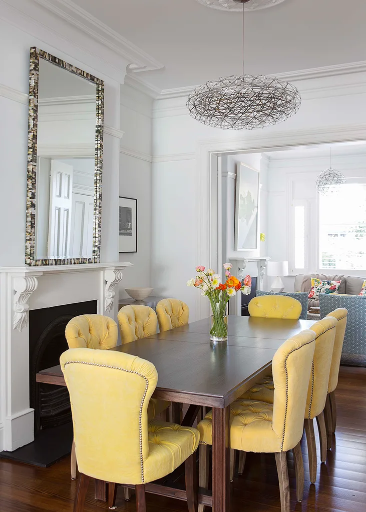 Dining room with yellow chairs