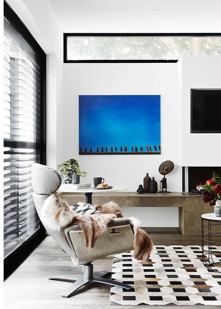 Living room with blue artwork