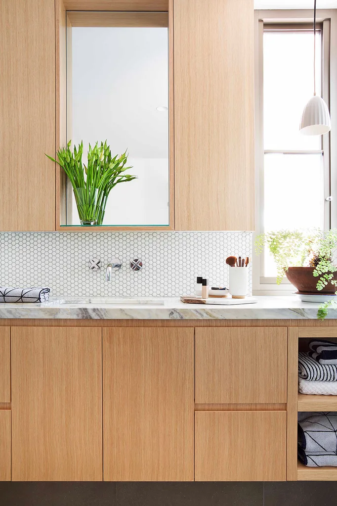 Timber and marble monochrome bathroom.