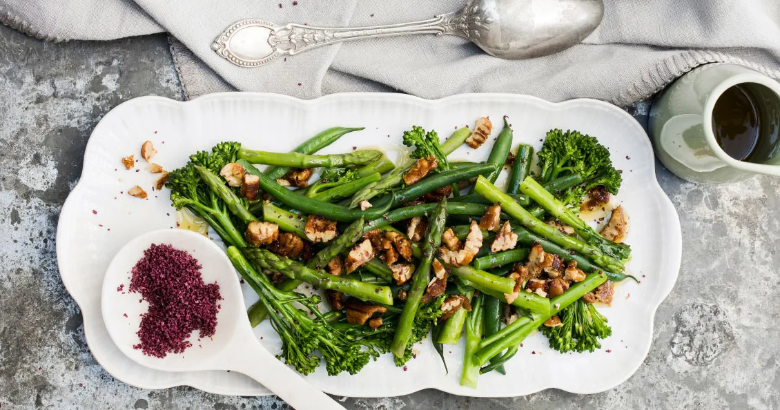 Steamed brocolini and asparagus with candied pecans Recipe | Home Beautiful