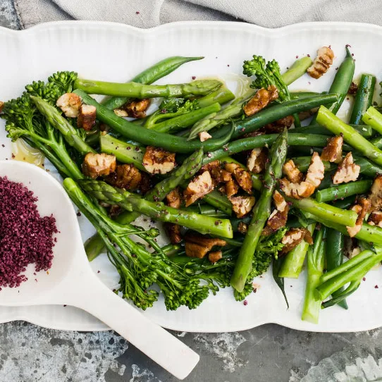 Steamed broccolini and asparagus with candied pecans