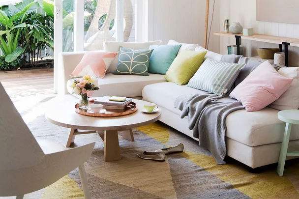 Living room with geo patterned rug on floor