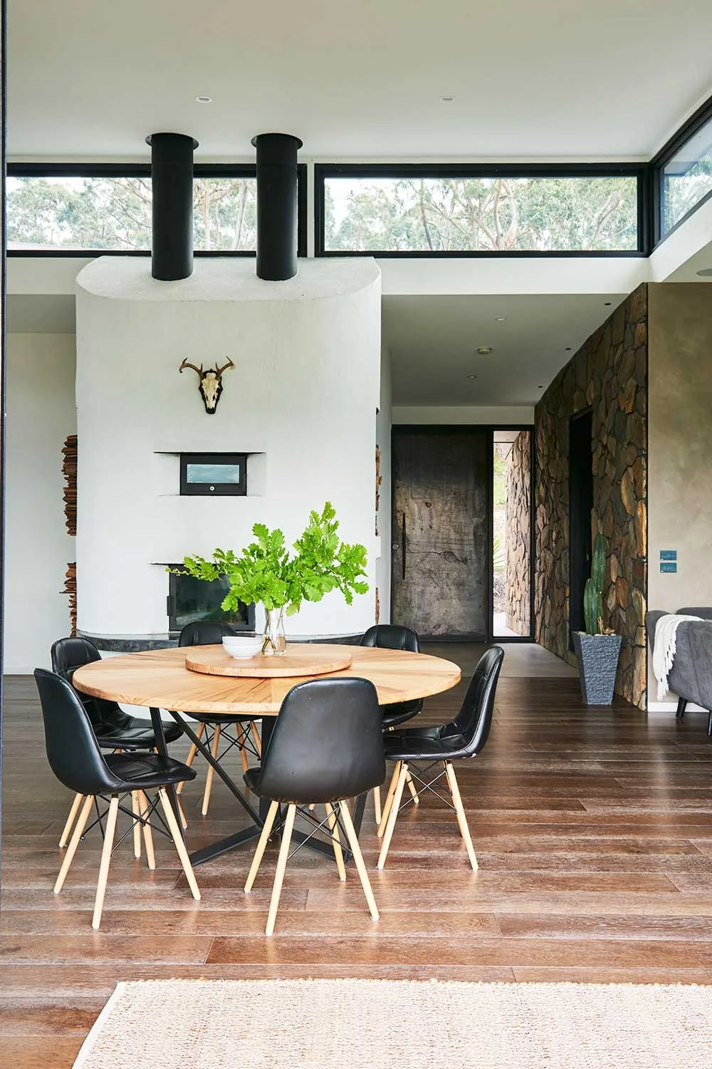 Living room with a dining table and eames chairs
