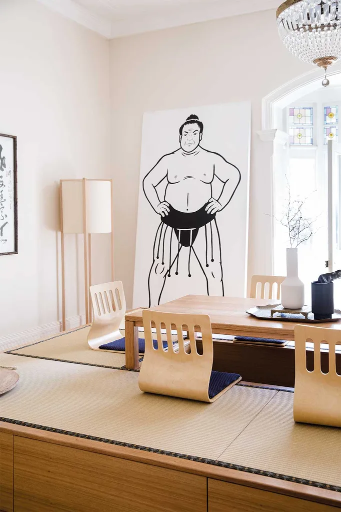 The tatami room of Masterchef winner Adam Liaw featuring sumo artwork