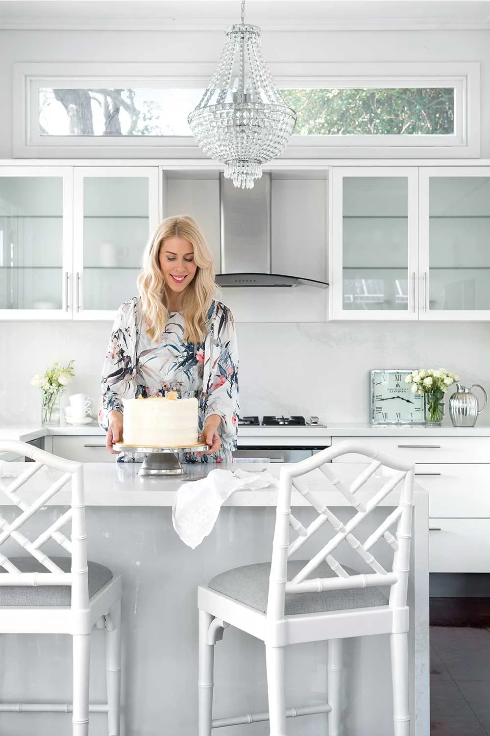 An all-white kitchen belonging to artist and illustrator Kerrie Hess, in her Queensland home