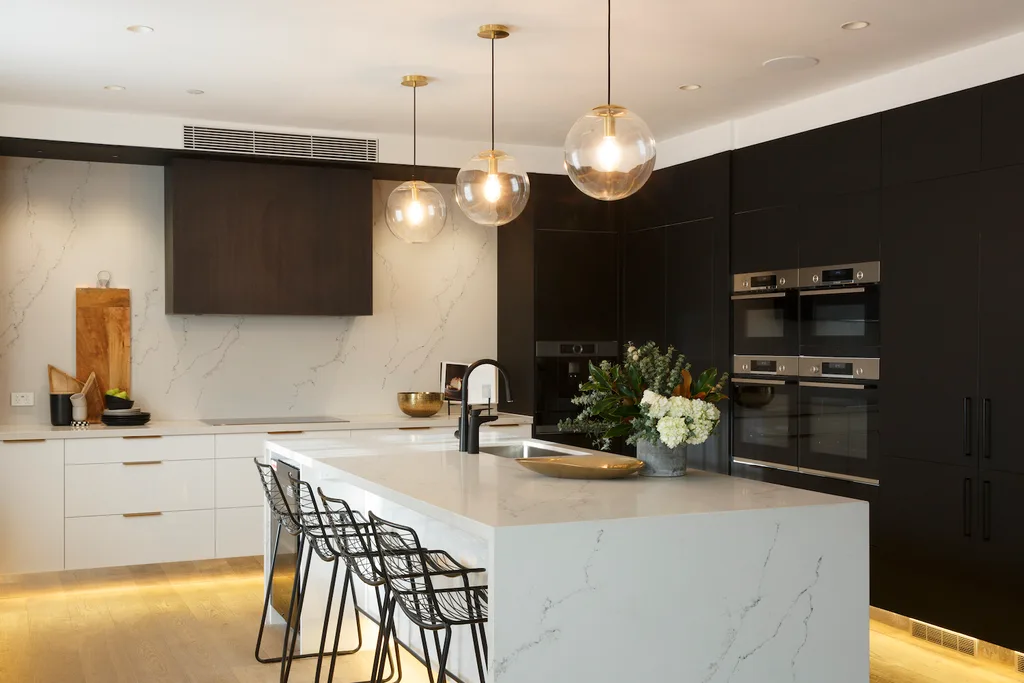 A kitchen island is a great place for people to gather around