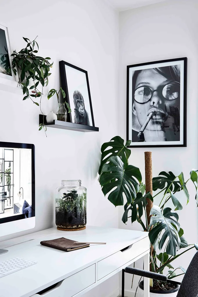 The workspace celebrates Scandi hallmarks of simplicity, functionality and an abundance of plants.