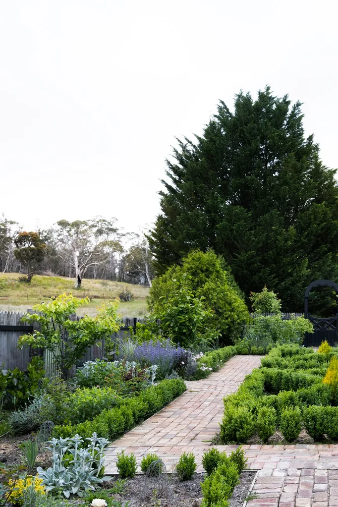 stone cottage parterre garden recycled brick path