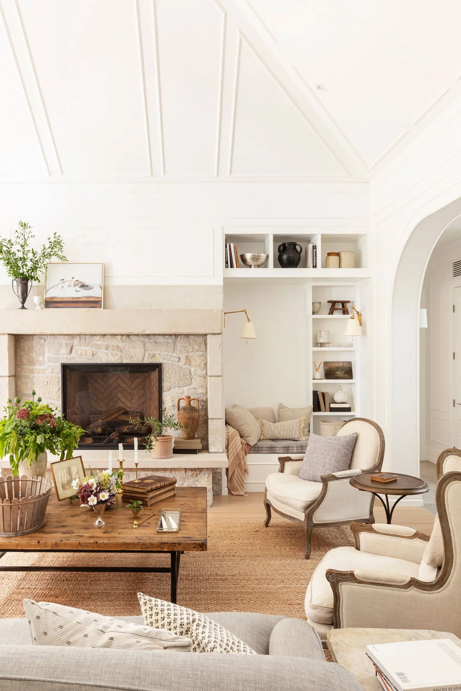 living room with fireplace and reading nook