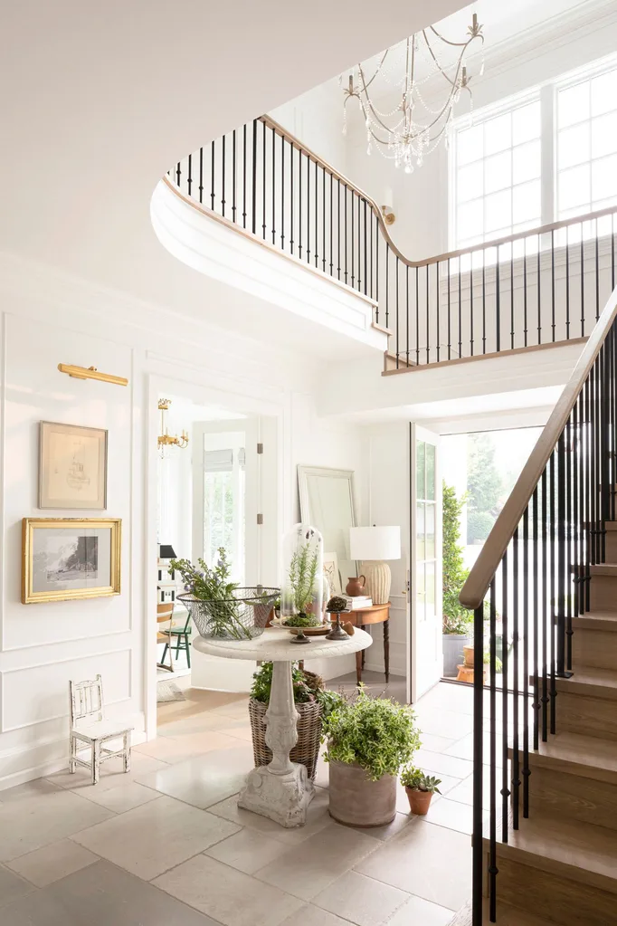 home-entrance-hallway-round-table-staircase