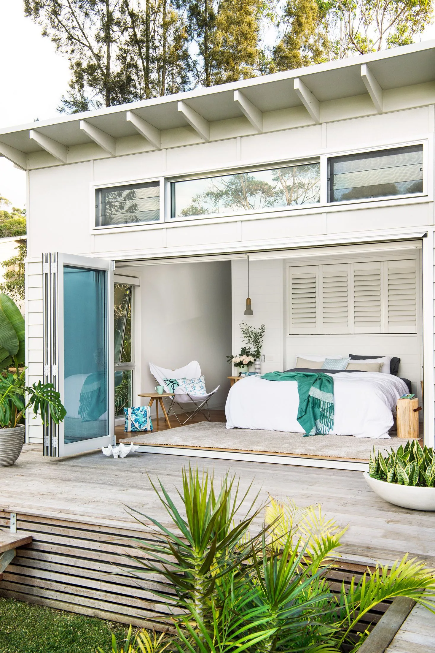 beach house bedroom deck bifold doors