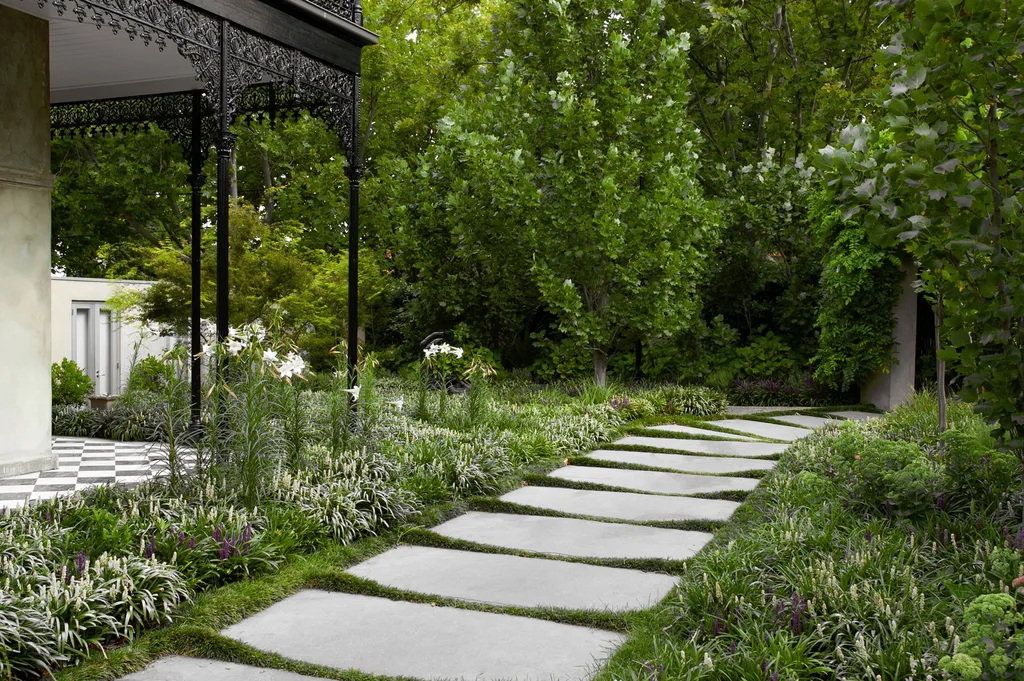 paved footpath with heritage home