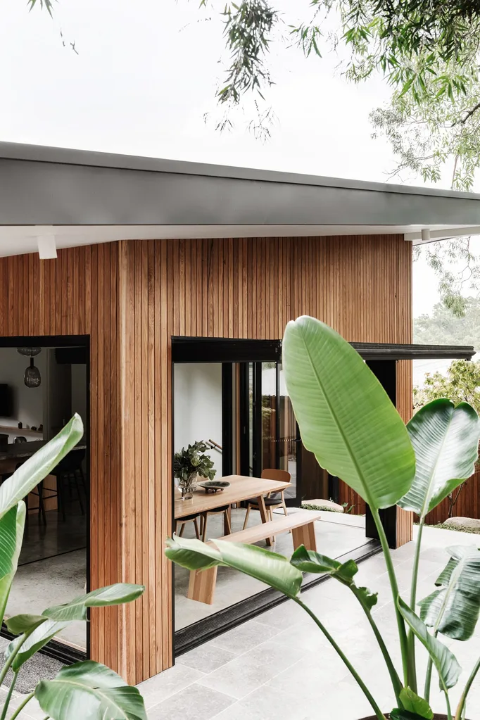 Melbourne bushland sustainable home rear timber exterior dining room
