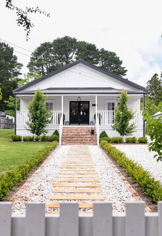 white cottage exterior garden path