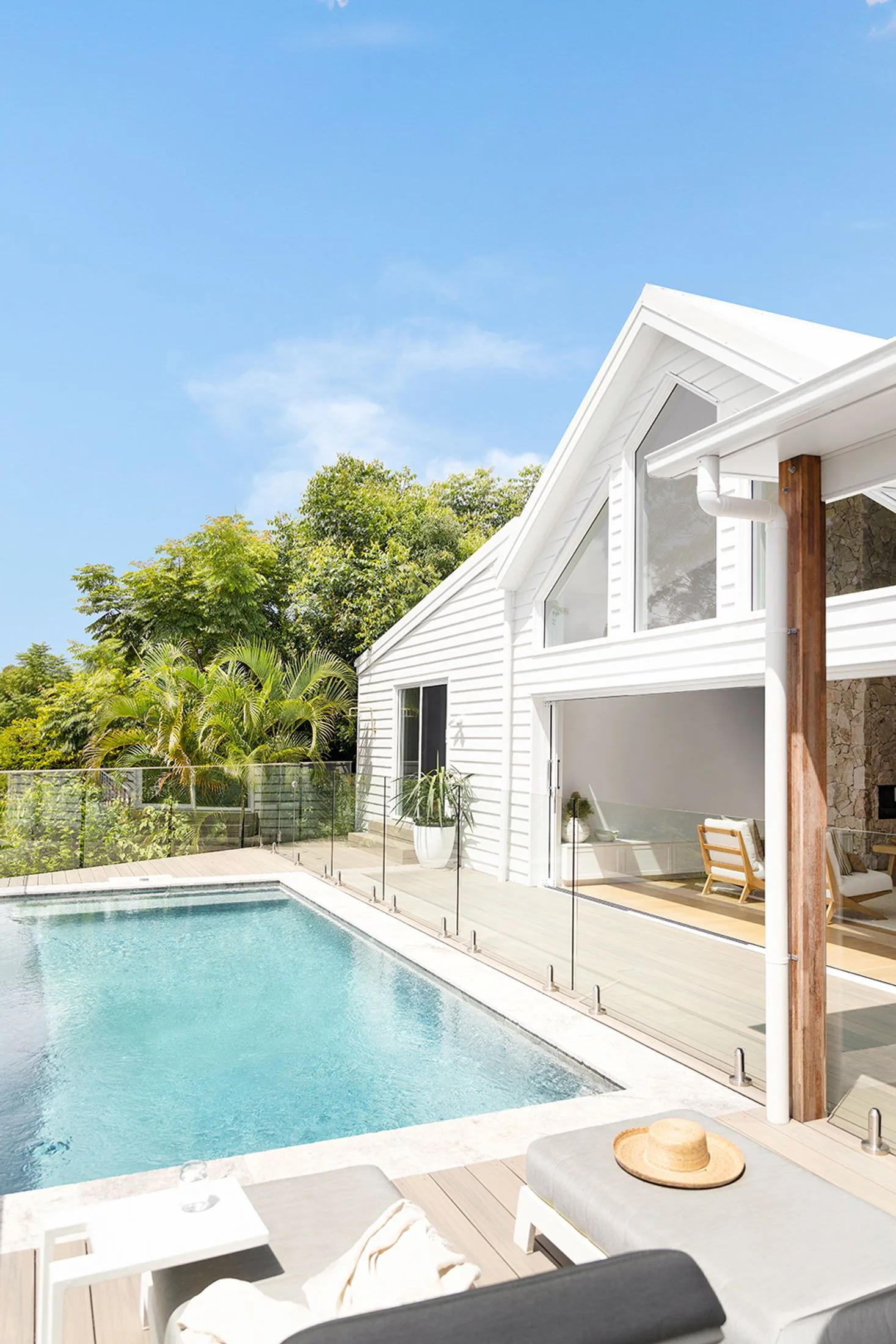 Hinterland swimming pool with outdoor living room and deck