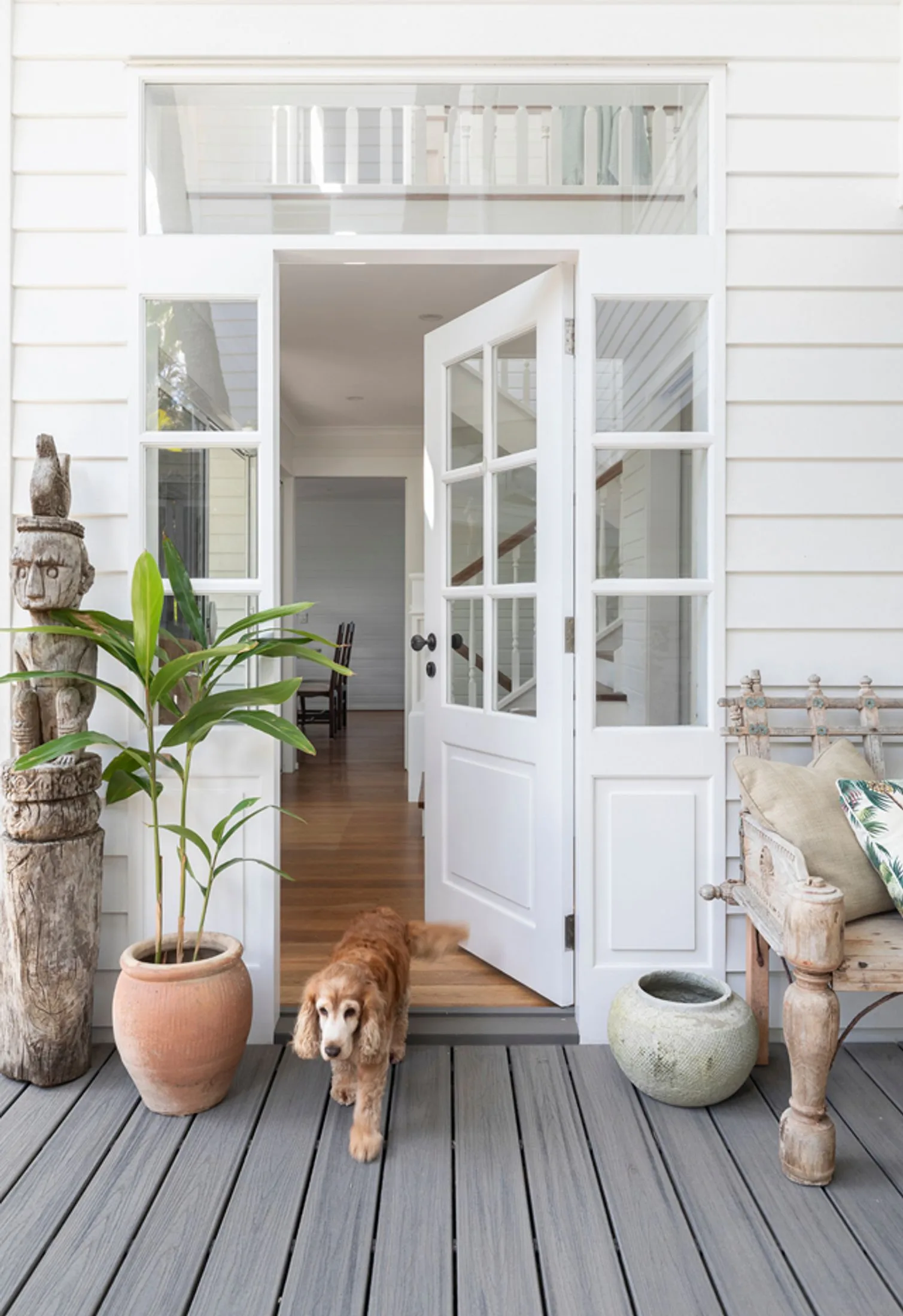 Front door with a terracotta pot next to it