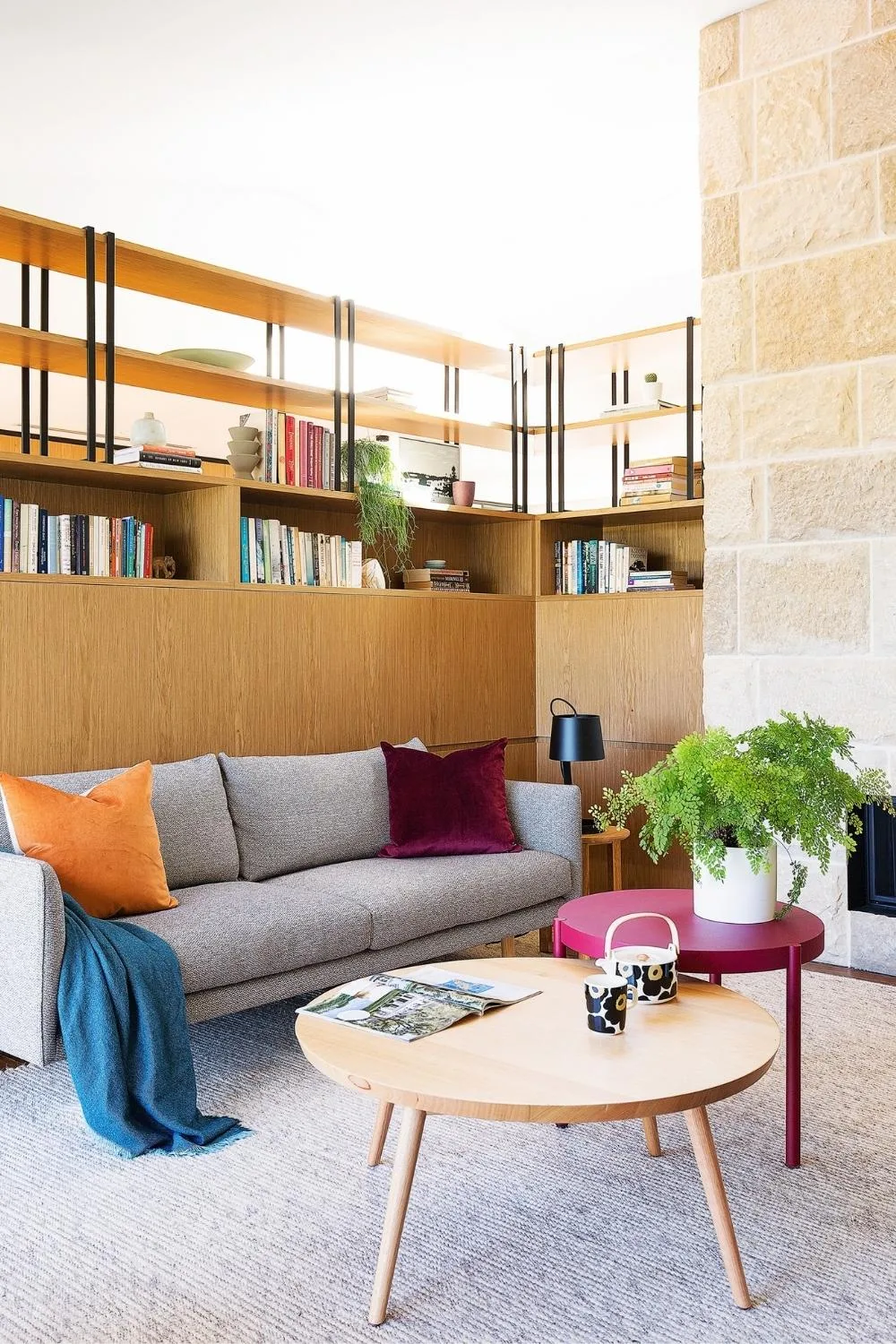 mid century inspred living room with maidenhair fern on the coffee table