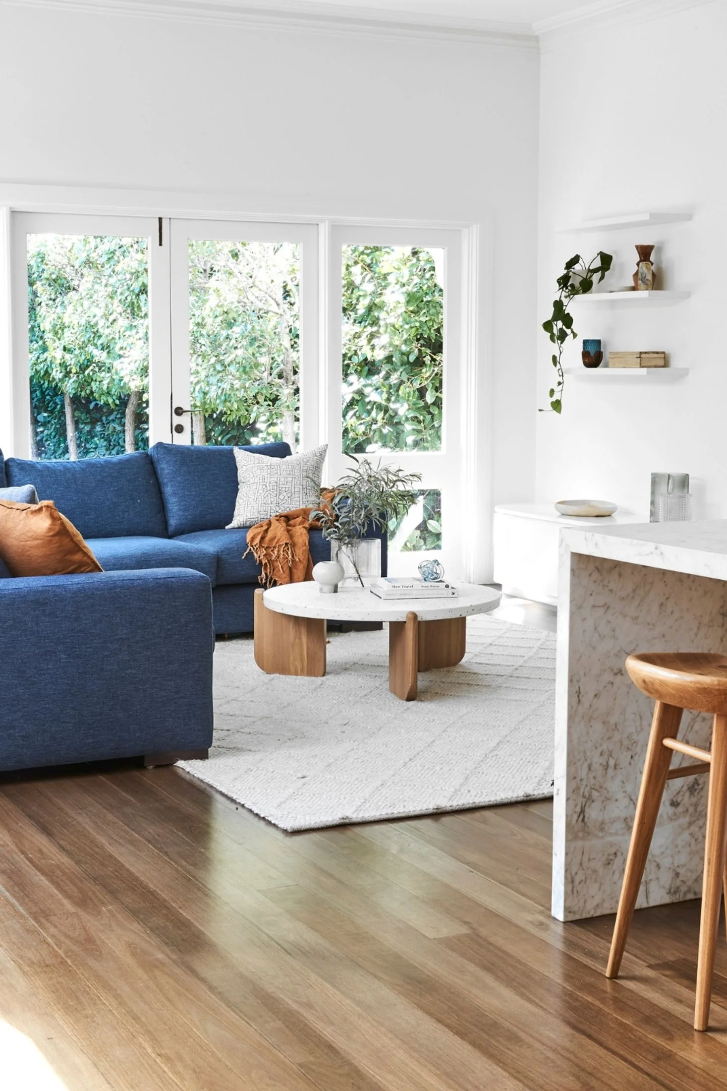 Open plan kitchen and living room with hardwood floors