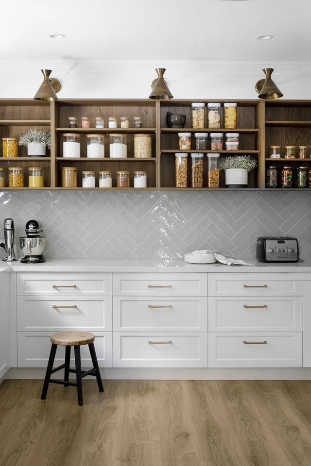 butler's pantry with grey herringbone subway tiles