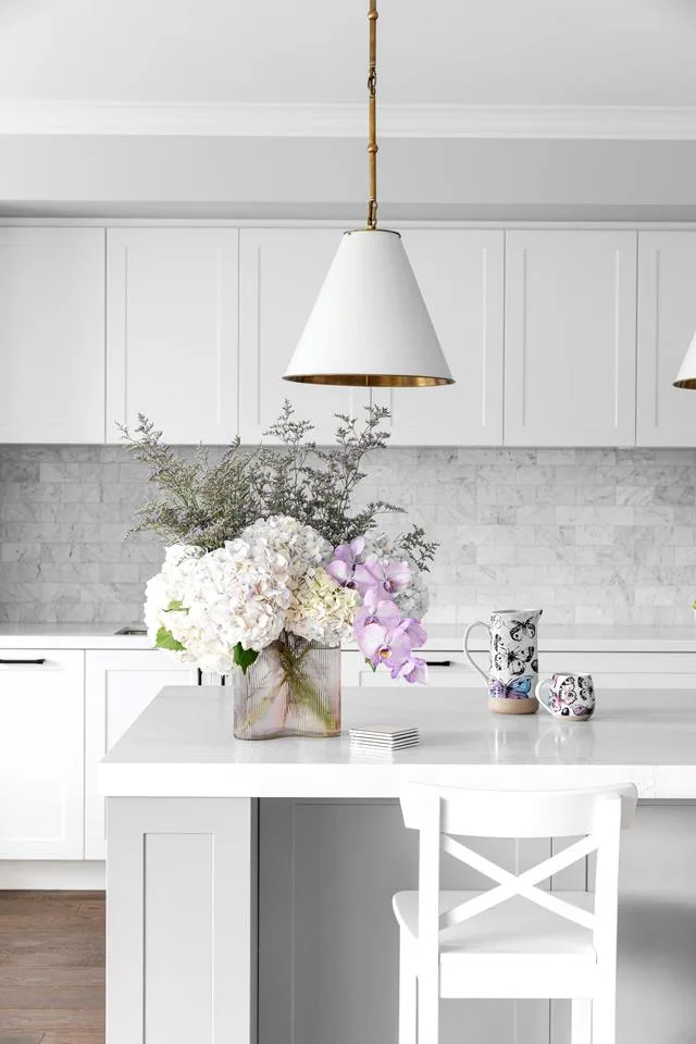 pale grey hamptons kitchen with marble subway tile splashback