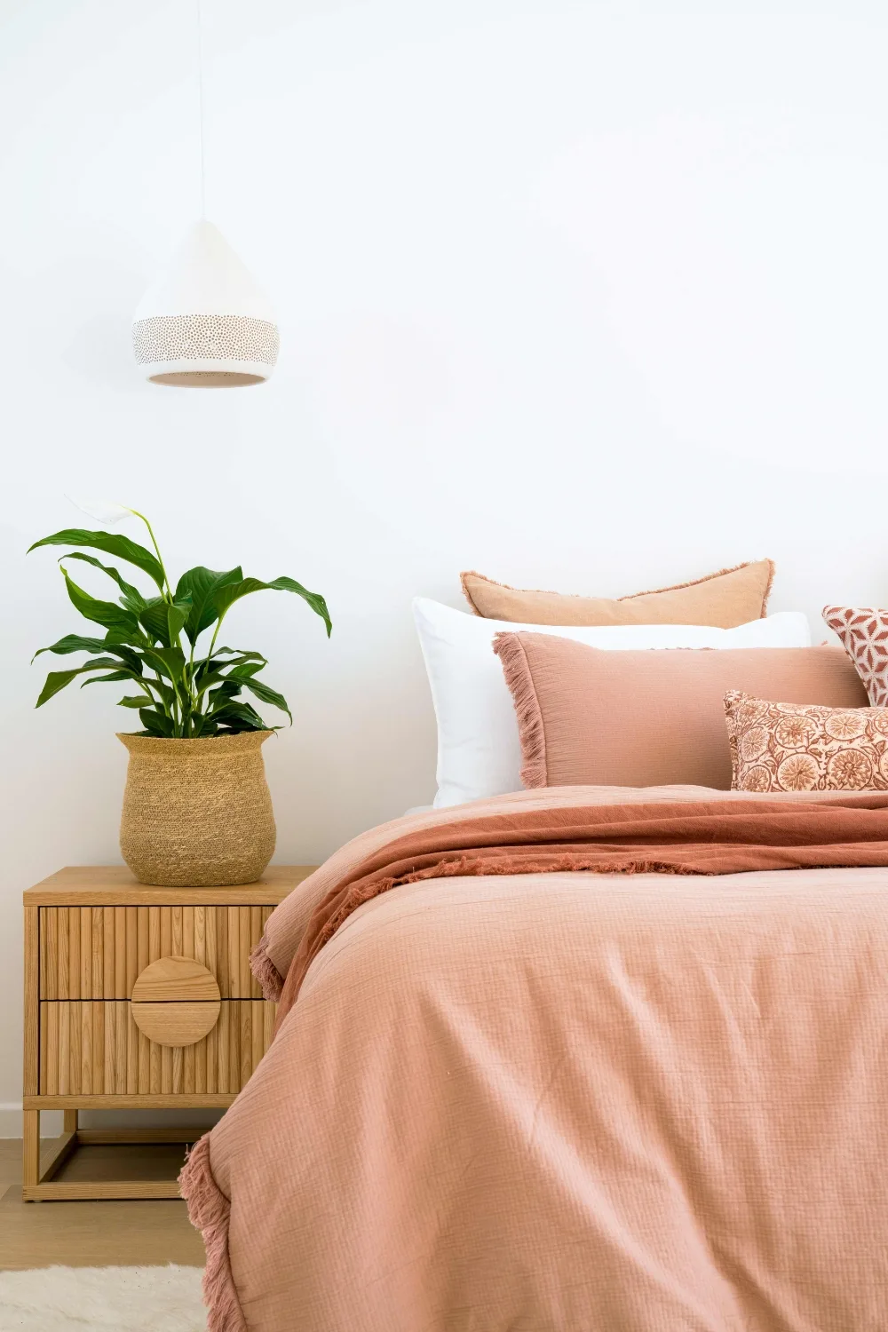 Peace lily on bedside table