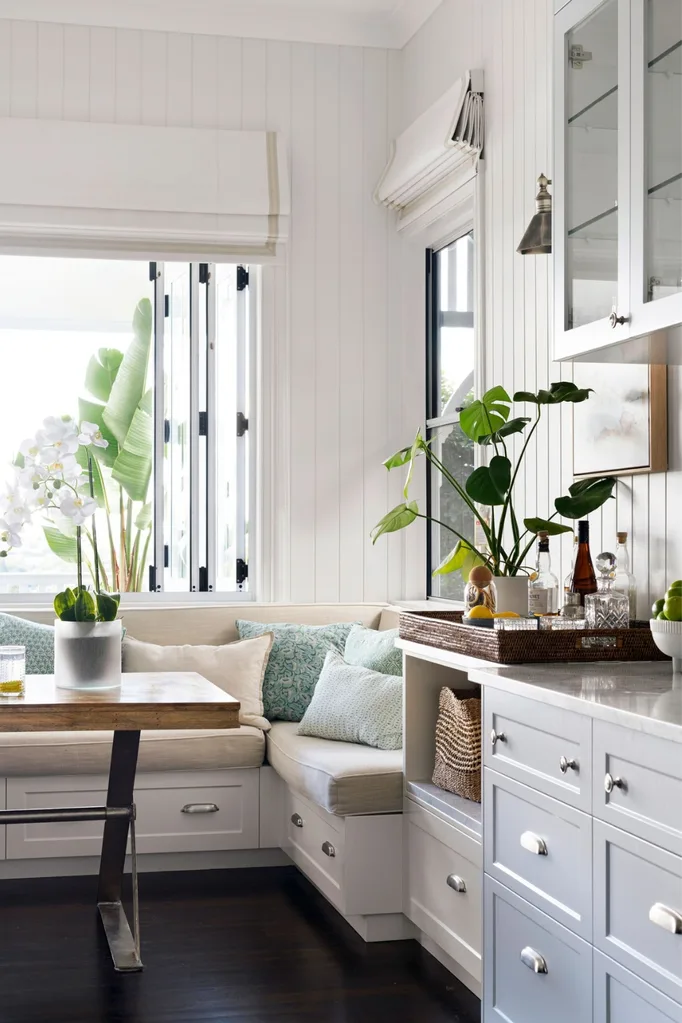 Monstera plant next to a home bar