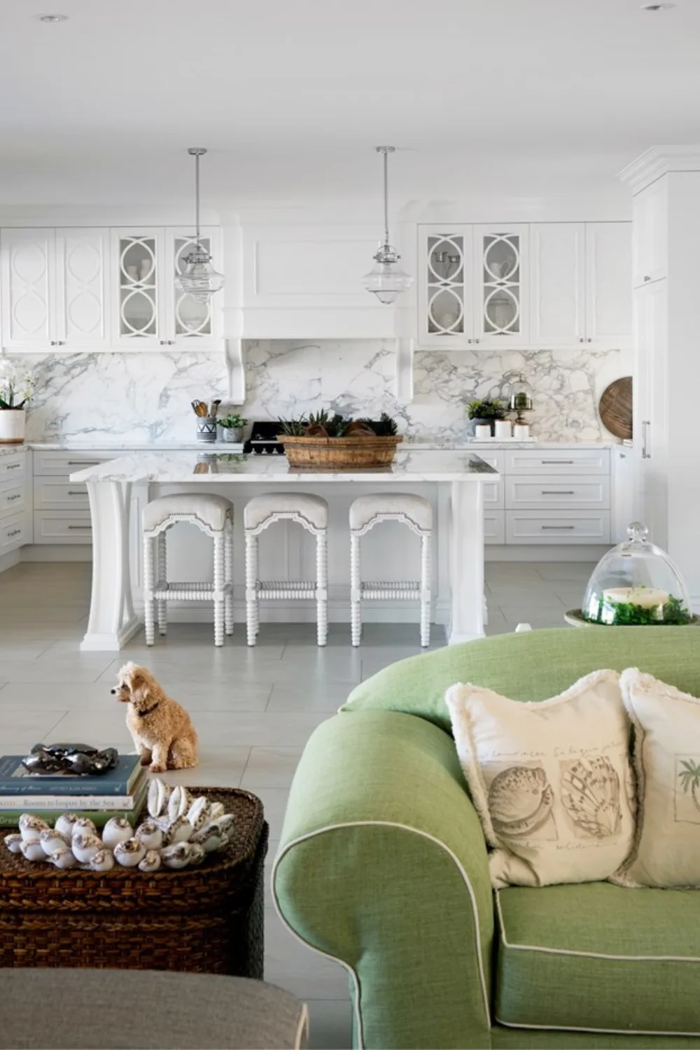 Hamptons kitchen living room with green sofa