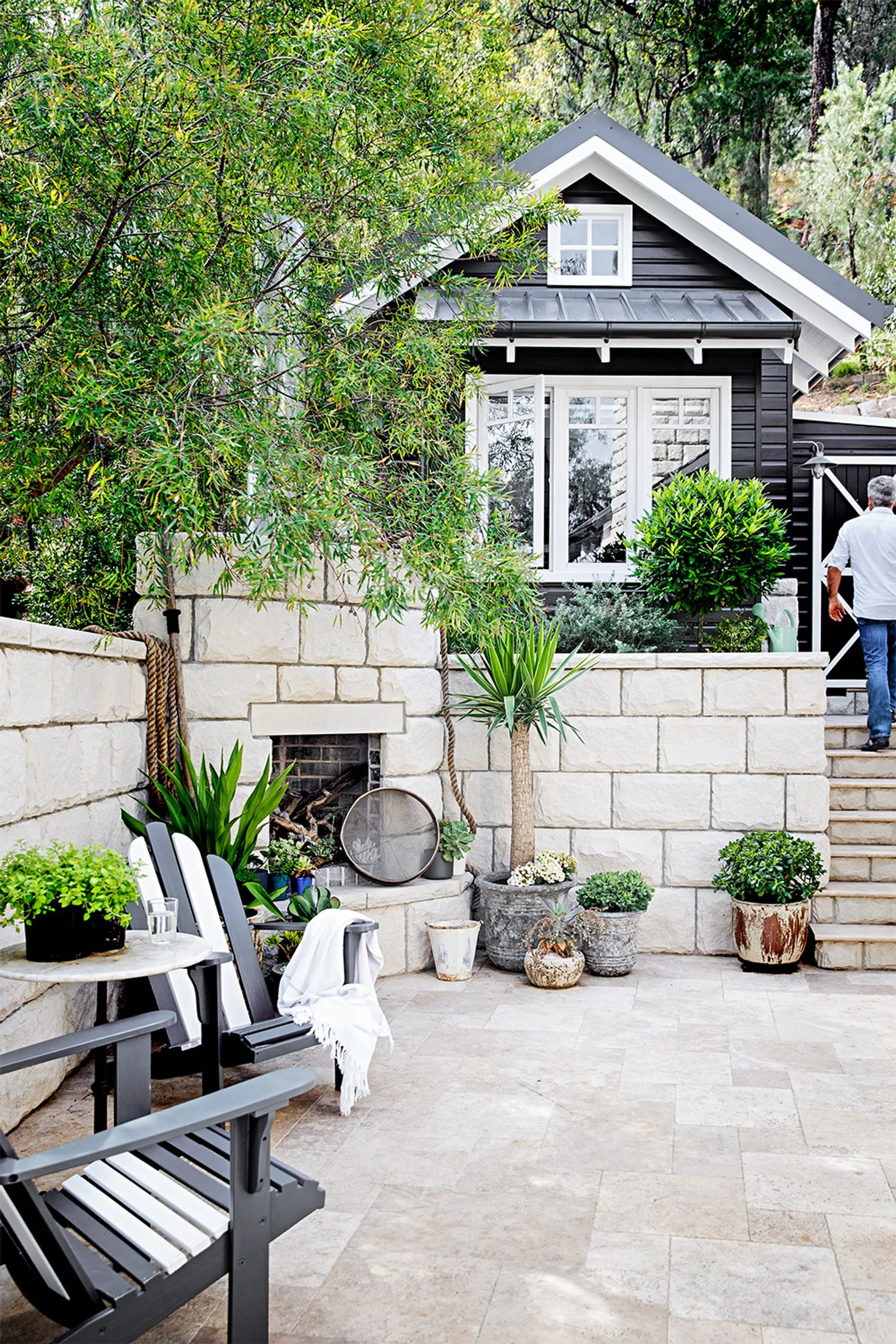 Tara Dennis home outdoor fireplace