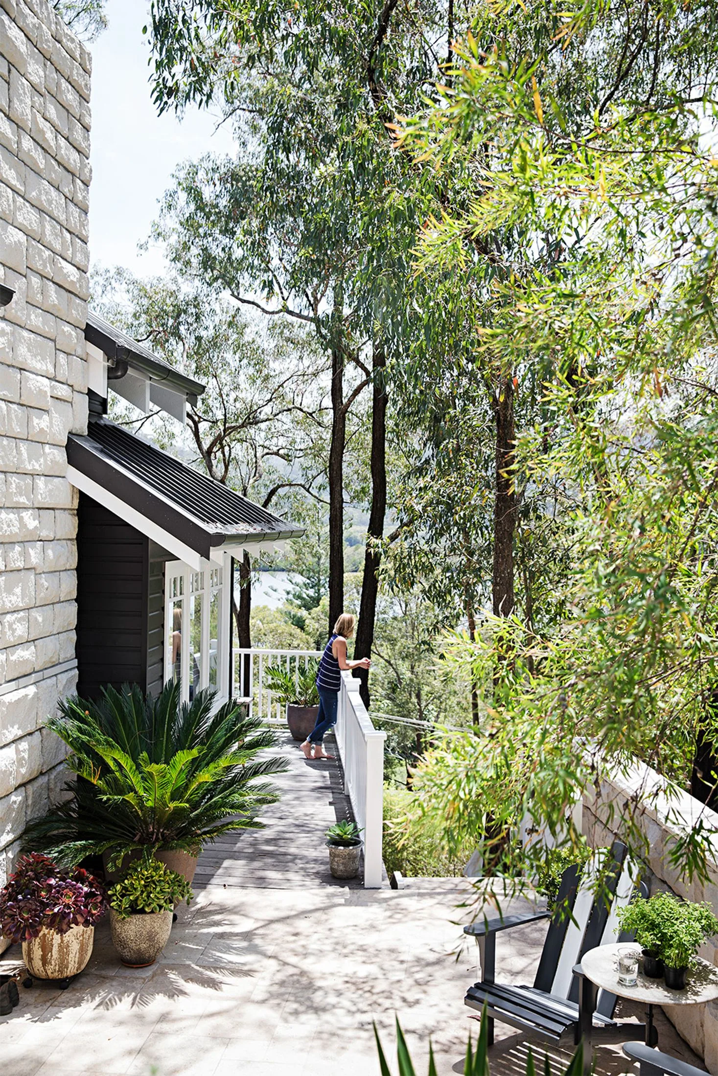 Tara Dennis river home black exterior