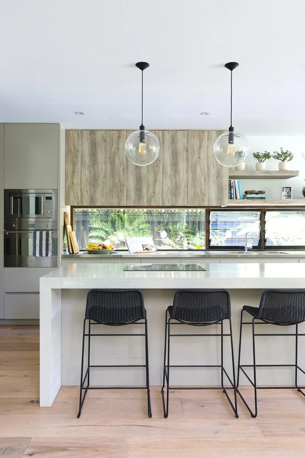 Modern kitchen with window splashback