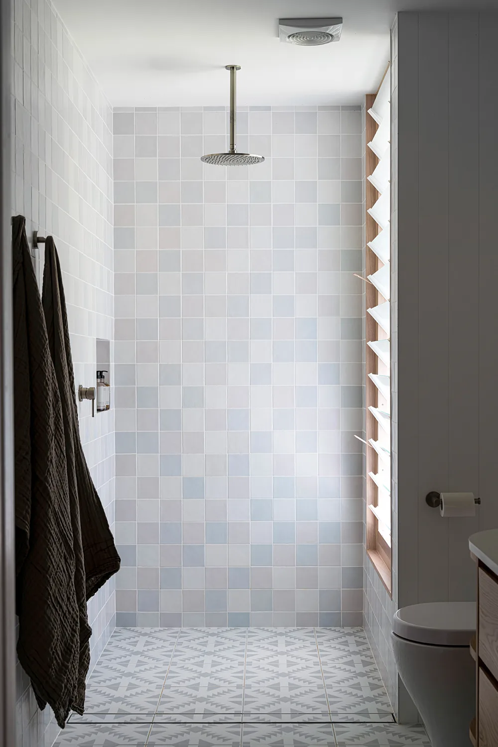 Luxury bathroom with fully tiled shower