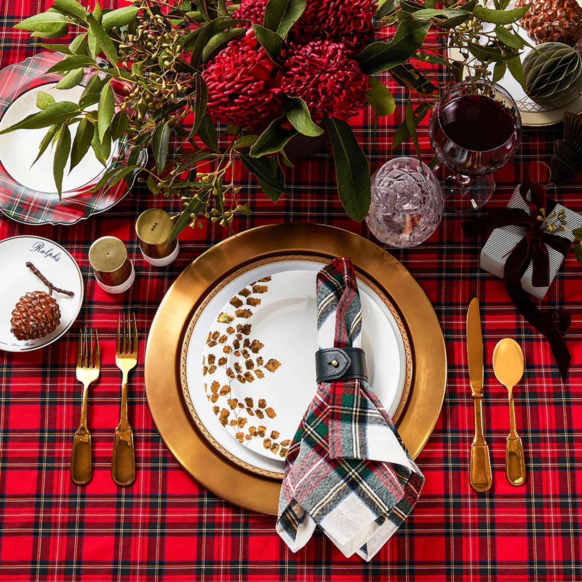 Red and green tartan Christmas table setting